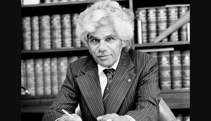 Senator Neville Bonner at his desk, 1979