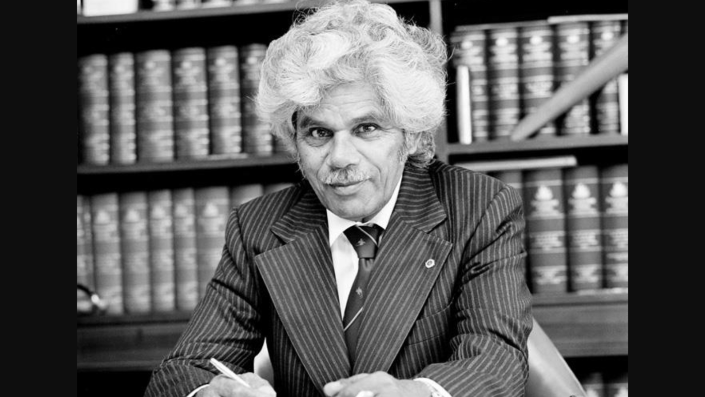 Senator Neville Bonner at his desk, 1979