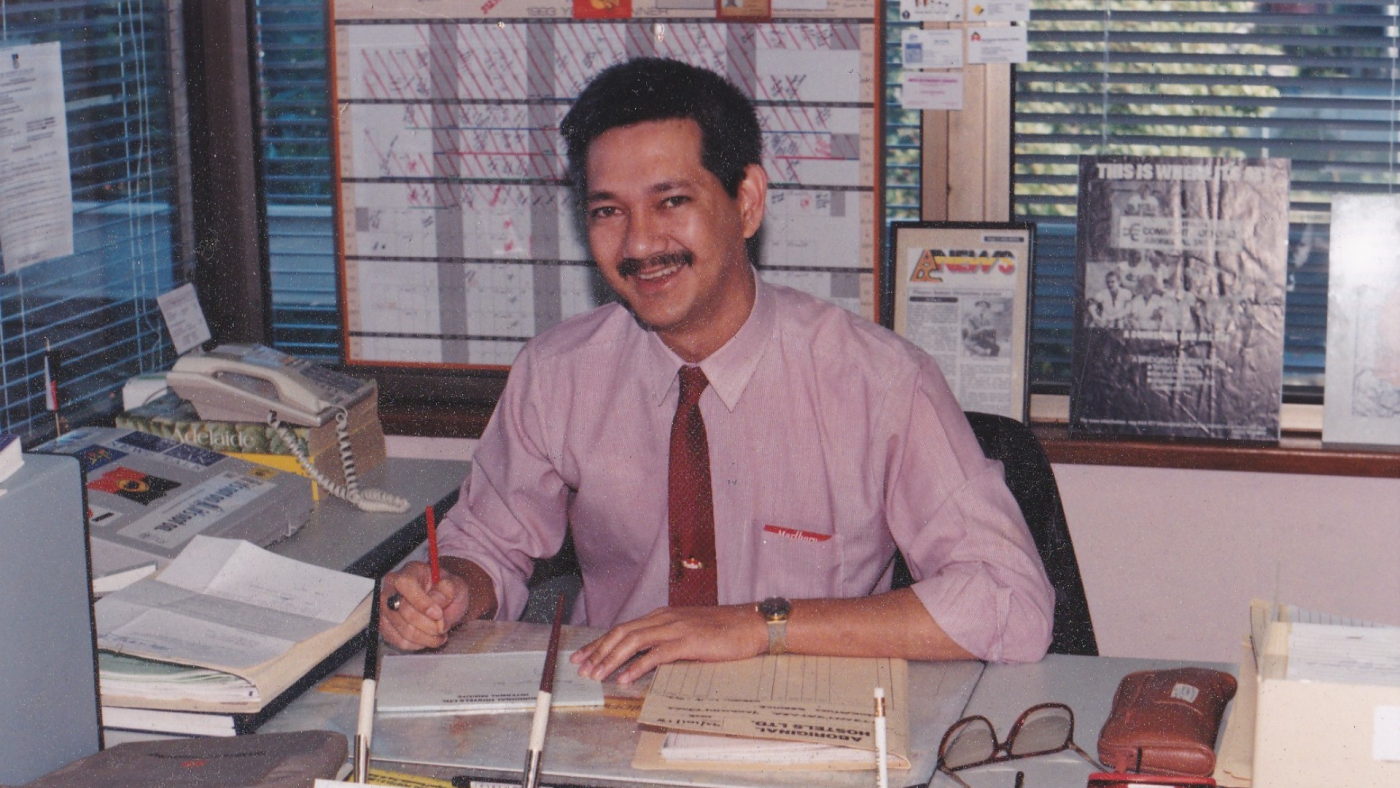 Ronald Jan sitting at this desk. 